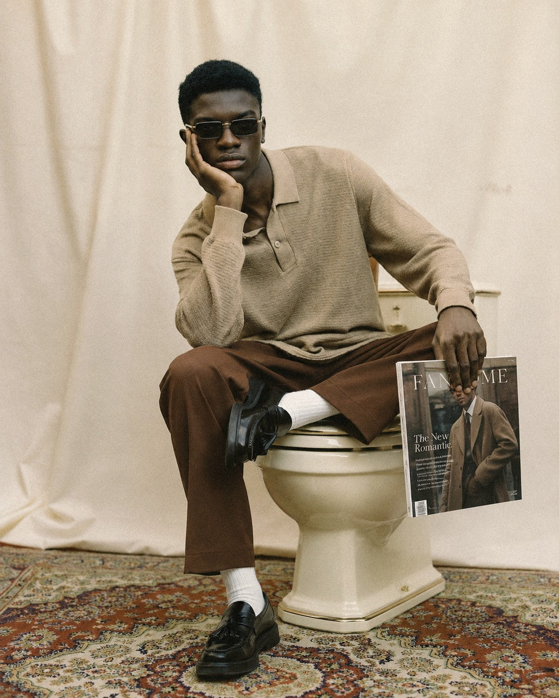 A seated figure in cream, the daily ritual reconsidered